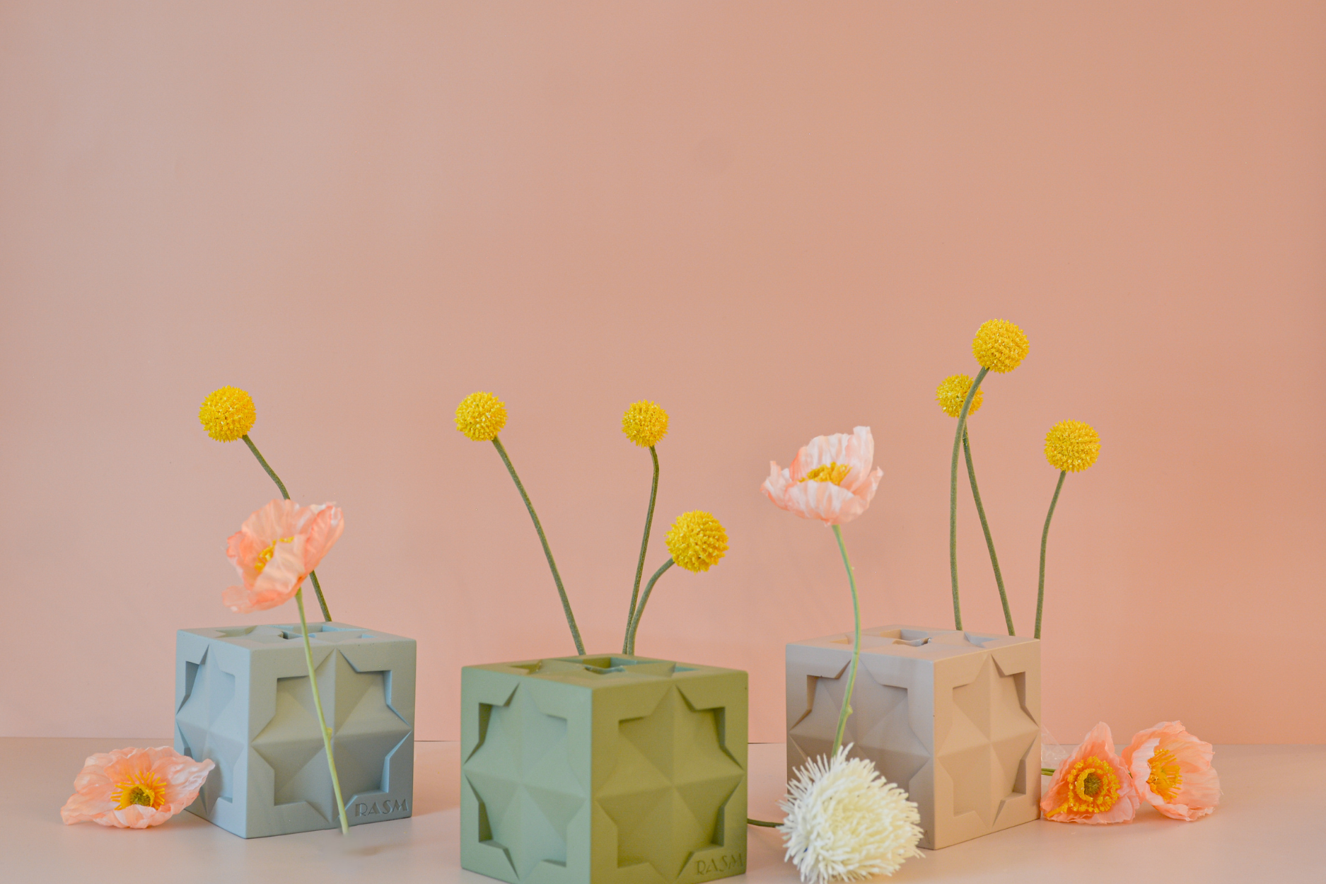 RASM's geometric base candle holders with flowers