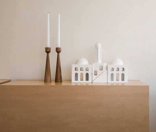 mosque and minaret that I am using for home decor, looking great on a tabletop, with the addition of two candles.