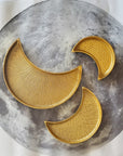 Golden Color Textured moonlight platter with all sizes Large, Medium, and Small placed on a round table